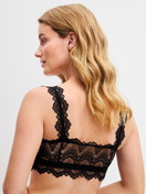 La modella / Il modello Donna indossa Bustier con pizzo in Poliammide di colore Nero, Pizzo, della serie Love Lace di CALIDA, Vista posteriore