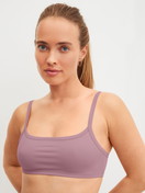 Damen-Model trägt Bustier aus Polyamid in Rosa, Einfarbig aus Serie Eco Sense Special von CALIDA, Vorderansicht