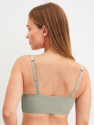 Le mannequin Femme porte le/la Bustier à bretelles réglables en Modal de couleur Vert, Unicolore, de la série Natural Skin de CALIDA, Vue arrière