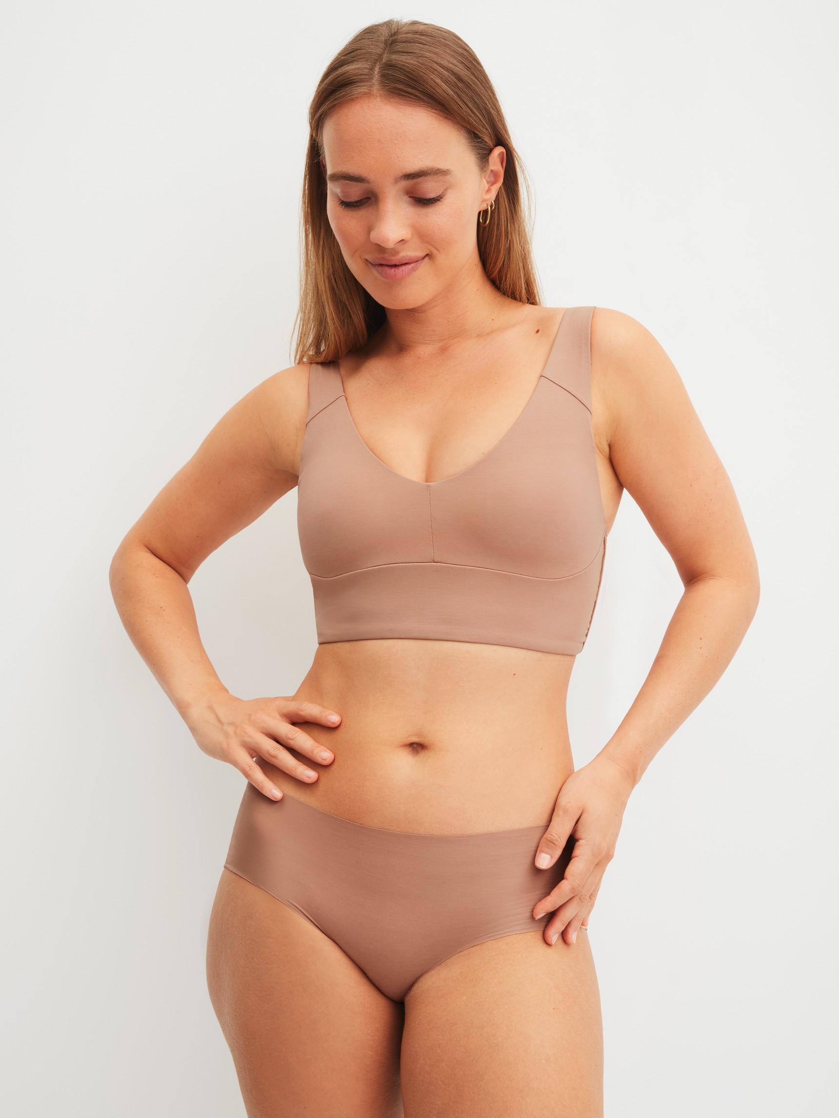 Women model is wearing Bustier with adjustable straps made of Modal in Grey, Unicoloured from the Natural Skin series by CALIDA, Outfit