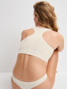 Women model is wearing Bustier made of Modal in White, Unicoloured from the Seamless Natural series by CALIDA, Additional Image