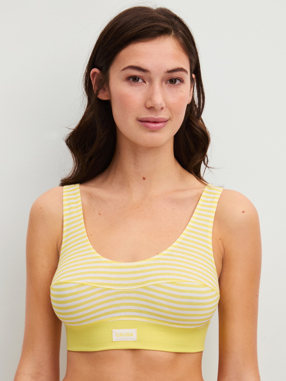 Women model is wearing Bustier made of Cotton in Yellow, Striped from the EDITION 85 series by CALIDA, Front view