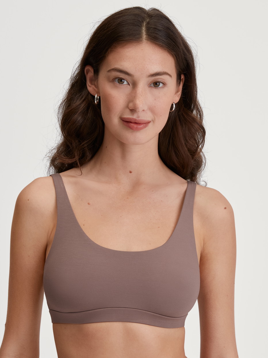 Women model is wearing Bustier made of Modal in Brown, Unicoloured from the Natural Skin series by CALIDA, Front view