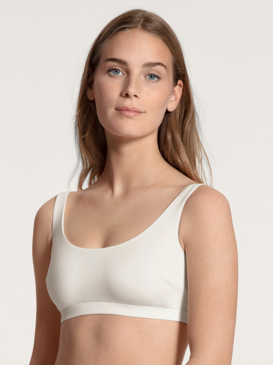 Women model is wearing Bustier made of Modal in White, Unicoloured from the Natural Skin series by CALIDA, Front view