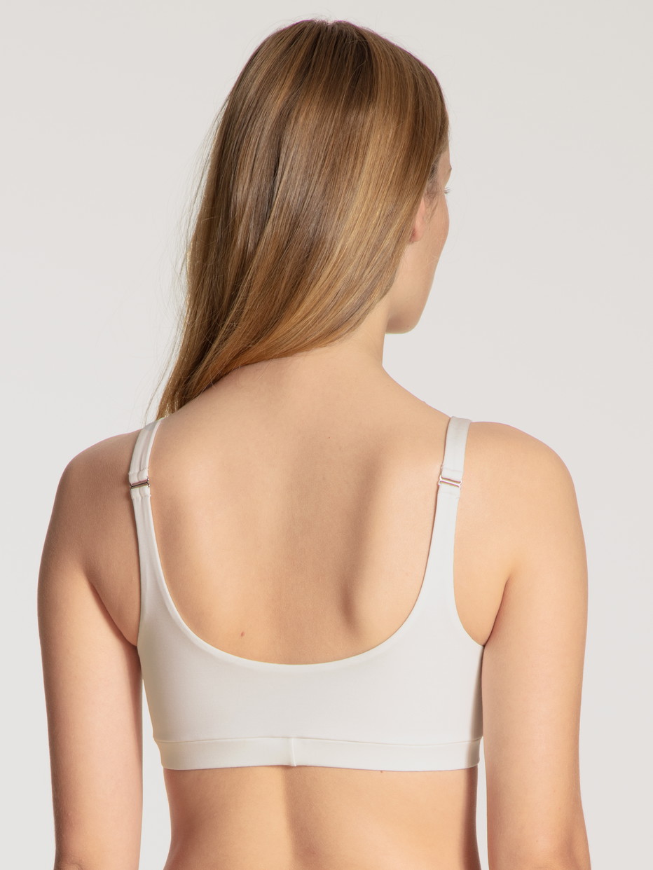 Women model is wearing Bustier made of Modal in White, Unicoloured from the Natural Skin series by CALIDA, Back view