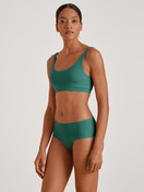 Women model is wearing Bustier made of Modal in Green, Unicoloured from the Natural Skin series by CALIDA, Front view, Outfit