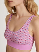 Women model is wearing Bustier made of Cotton in Pink, Motif from the Elastic Trend series by CALIDA, Detail
