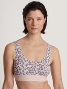 Women model is wearing Bustier made of Cotton in Pink, Floral from the Elastic Trend series by CALIDA, Front view