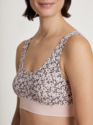 Women model is wearing Bustier made of Cotton in Pink, Floral from the Elastic Trend series by CALIDA, Detail