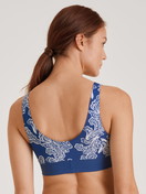 Women model is wearing Bustier made of Cotton in Blue, Motif from the Elastic Trend series by CALIDA, Back view