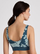 Women model is wearing Bustier made of Cotton in Turquoise, Patterned from the Elastic Trend series by CALIDA, Back view