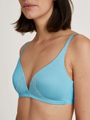 Women model is wearing Triangle bra without underwire made of Viscose in Turquoise, Lace from the Sensual Secrets series by CALIDA, Detail