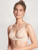 Women model is wearing Soft non-wired bra made of Polyamide in Beige, Lace from the Sensual Secrets series by CALIDA, Front view