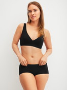 Women model is wearing Soft bra made of Polyamide in Black, Unicoloured from the Sleek Skin series by CALIDA, Outfit