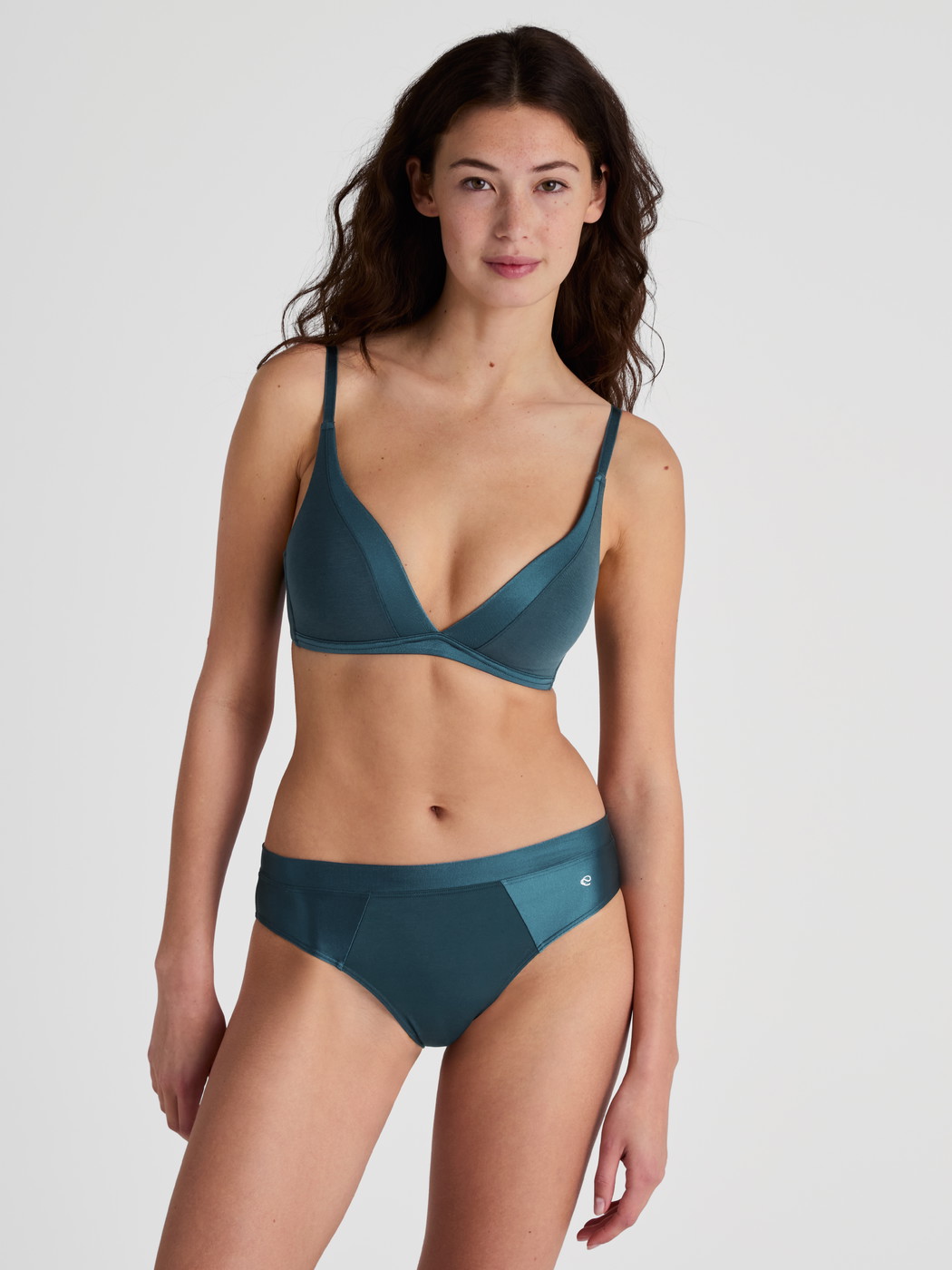Women model is wearing Soft bra without underwire made of Cotton in Turquoise, Unicoloured from the Cate series by CALIDA, Outfit