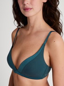 Women model is wearing Soft bra without underwire made of Cotton in Turquoise, Unicoloured from the Cate series by CALIDA, Detail