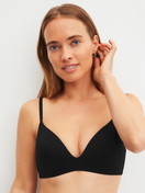 Women model is wearing Padded bra without underwire made of Polyamide in Black, Unicoloured from the Sleek Skin series by CALIDA, Front view