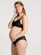 Women model is wearing Nursing bra without underwire made of Lyocell in Black, Unicoloured from the 100% Nature Mum series by CALIDA, Front view, Outfit
