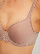 Women model is wearing Spacer bra made of Polyamide in Brown, Lace from the Natural Comfort Lace series by CALIDA, Detail
