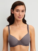 Women model is wearing Spacer bra made of Polyamide in Brown, Lace from the Natural Comfort Lace series by CALIDA, Front view