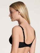 Women model is wearing Spacer bra made of Polyamide in Black, Lace from the Natural Comfort Lace series by CALIDA, Back view
