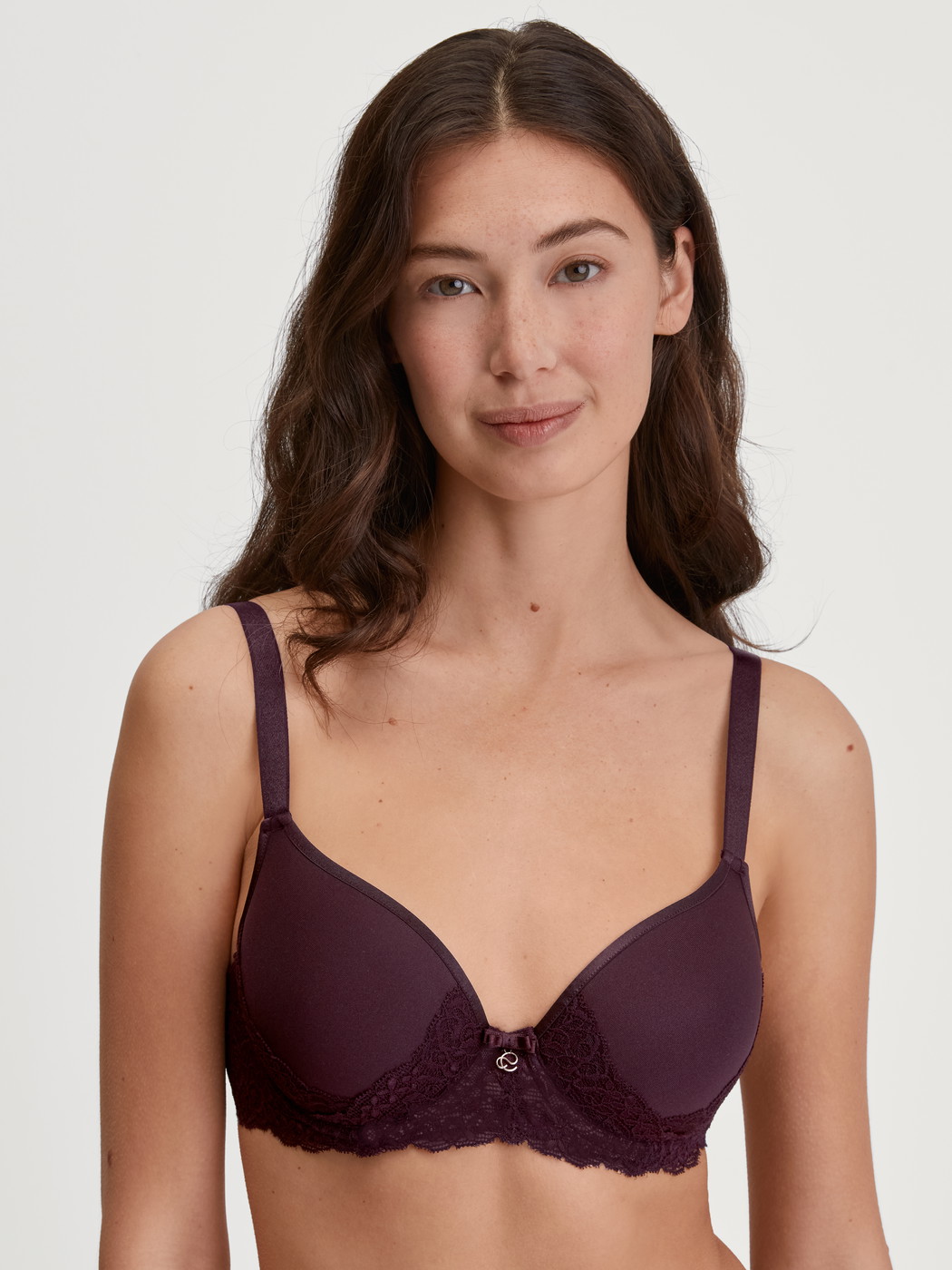 Women model is wearing Spacer bra with wires made of Polyamide in Red, Lace from the Sensual Secrets series by CALIDA, Front view