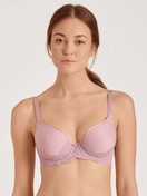 Women model is wearing Spacer bra with wires made of Polyamide in Purple, Lace from the  series by CALIDA, Front view