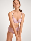 Women model is wearing Spacer bra with wires made of Polyamide in Purple, Lace from the  series by CALIDA, Front view