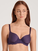 Women model is wearing Spacer bra with wires made of Polyamide in Purple, Lace from the Sensual Secrets series by CALIDA, Front view
