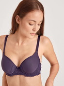 Women model is wearing Spacer bra with wires made of Polyamide in Purple, Lace from the Sensual Secrets series by CALIDA, Front view