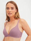 Women model is wearing Triangle bra without underwire made of Polyamide in Pink, Unicoloured from the Eco Sense Special series by CALIDA, Front view