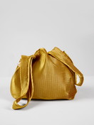  model is wearing Anniversary bag made of  in ,  from the EDITION 85 series by CALIDA, Back view