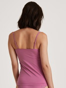 Women model is wearing Spaghetti top made of Cotton in Purple, Lace from the Natural Comfort Lace series by CALIDA, Back view