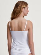 Women model is wearing Spaghetti top made of Polyamide in White, Unicoloured from the Sleek Skin series by CALIDA, Back view