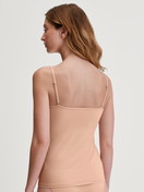 Women model is wearing Spaghetti top made of Cotton in Beige, Unicoloured from the Sleek Skin series by CALIDA, Front view