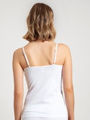 Women model is wearing Spaghetti Top, 2-Pack made of Cotton in White, Unicoloured from the Benefit Women series by CALIDA, Back view