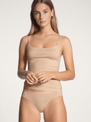 Women model is wearing Spaghetti top made of Cotton in Beige, Unicoloured from the Natural Comfort series by CALIDA, Outfit, Front view