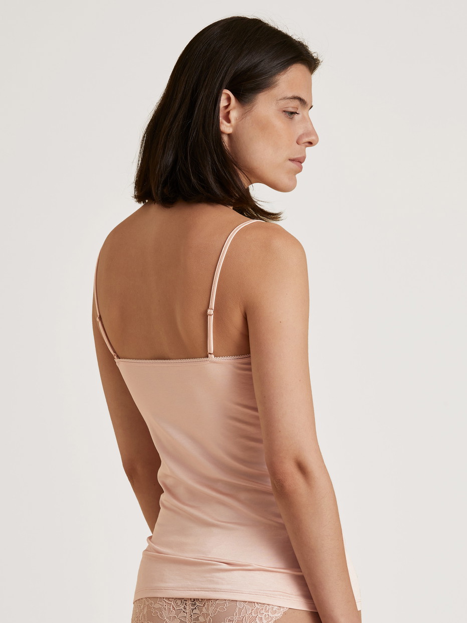 Women model is wearing Spaghetti strap top with lace made of Cotton in Beige, Unicoloured from the Sensual Secrets series by CALIDA, Back view