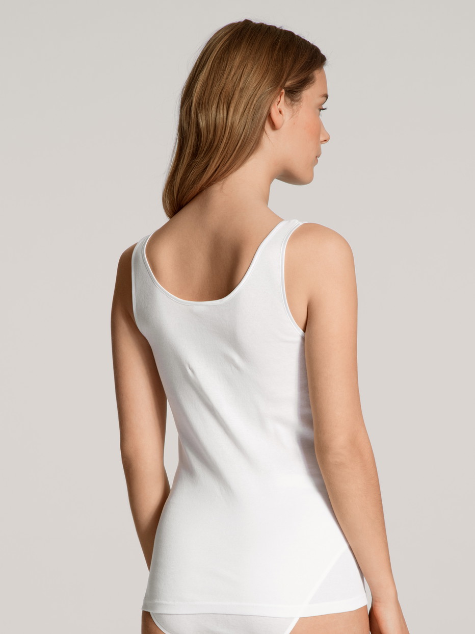 Le mannequin Femme porte le/la Débardeur en 100% coton de couleur Blanc, Unicolore, de la série Light de CALIDA, Vue arrière