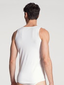 Men model is wearing Tank-Top made of Cotton in White, Unicoloured from the Cotton Code series by CALIDA, Back view
