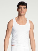 Men model is wearing Tank Top, 2-Pack made of Cotton in White, Unicoloured from the Natural Benefit series by CALIDA, Front view