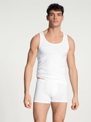 Men model is wearing Tank Top, 2-Pack made of Cotton in White, Unicoloured from the Natural Benefit series by CALIDA, Outfit
