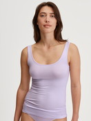 Women model is wearing Tank top made of Cotton in Purple, Unicoloured from the Natural Comfort series by CALIDA, Front view