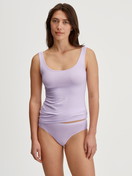 Women model is wearing Tank top made of Cotton in Purple, Unicoloured from the Natural Comfort series by CALIDA, Outfit