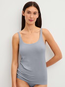 Women model is wearing Tank top with bustier made of Modal in Grey, Unicoloured from the Natural Skin series by CALIDA, Front view
