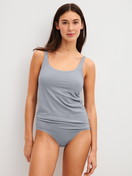 Women model is wearing Tank top with bustier made of Modal in Grey, Unicoloured from the Natural Skin series by CALIDA, Outfit