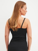 Women model is wearing Tank top with bustier made of Modal in Black, Unicoloured from the Natural Skin series by CALIDA, Back view
