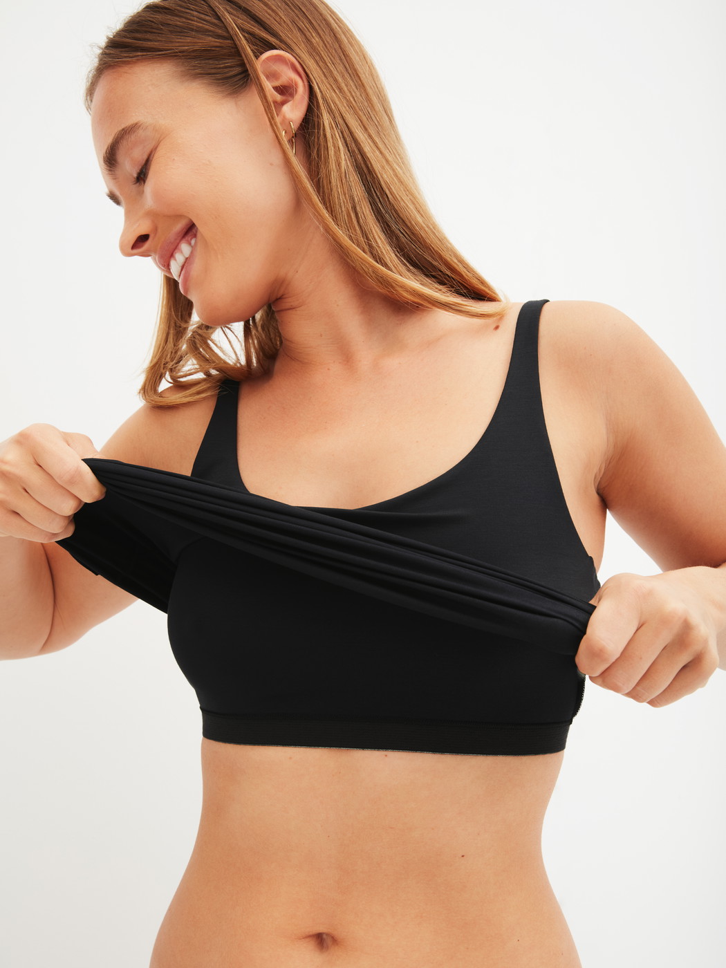 Women model is wearing Tank top with bustier made of Modal in Black, Unicoloured from the Natural Skin series by CALIDA, Additional Image