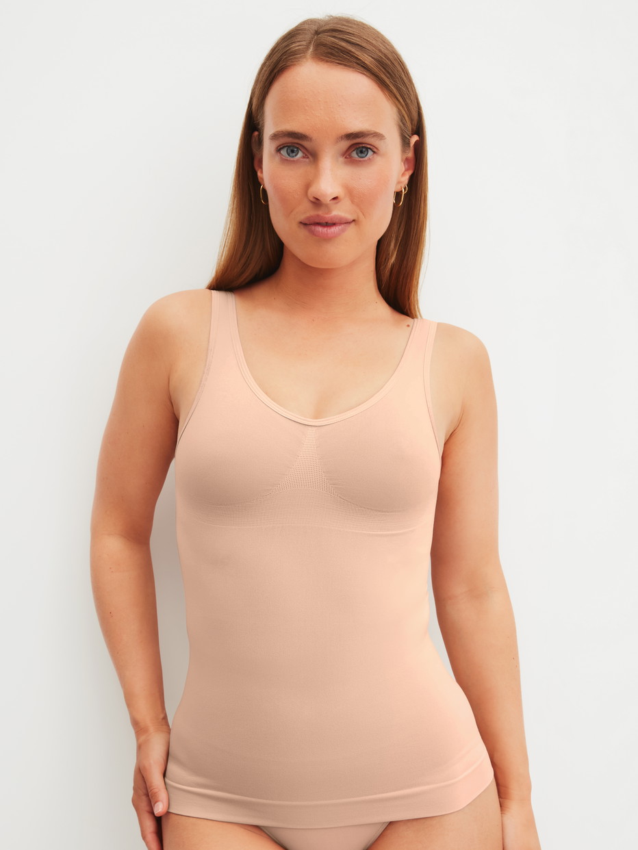 Le mannequin Femme porte le/la Débardeur gainant en Polyamide de couleur Rose, Unicolore, de la série Seamless Shape de CALIDA, Vue de face