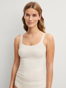 Women model is wearing Spaghetti top made of Modal in White, Unicoloured from the Seamless Natural series by CALIDA, Front view